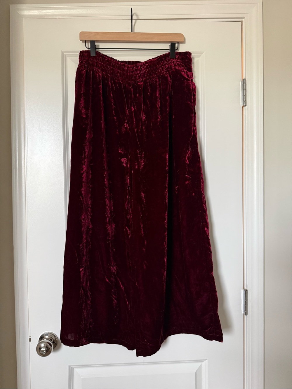 Anthropologie Velvet Boot‑Cut Trousers in Burgundy